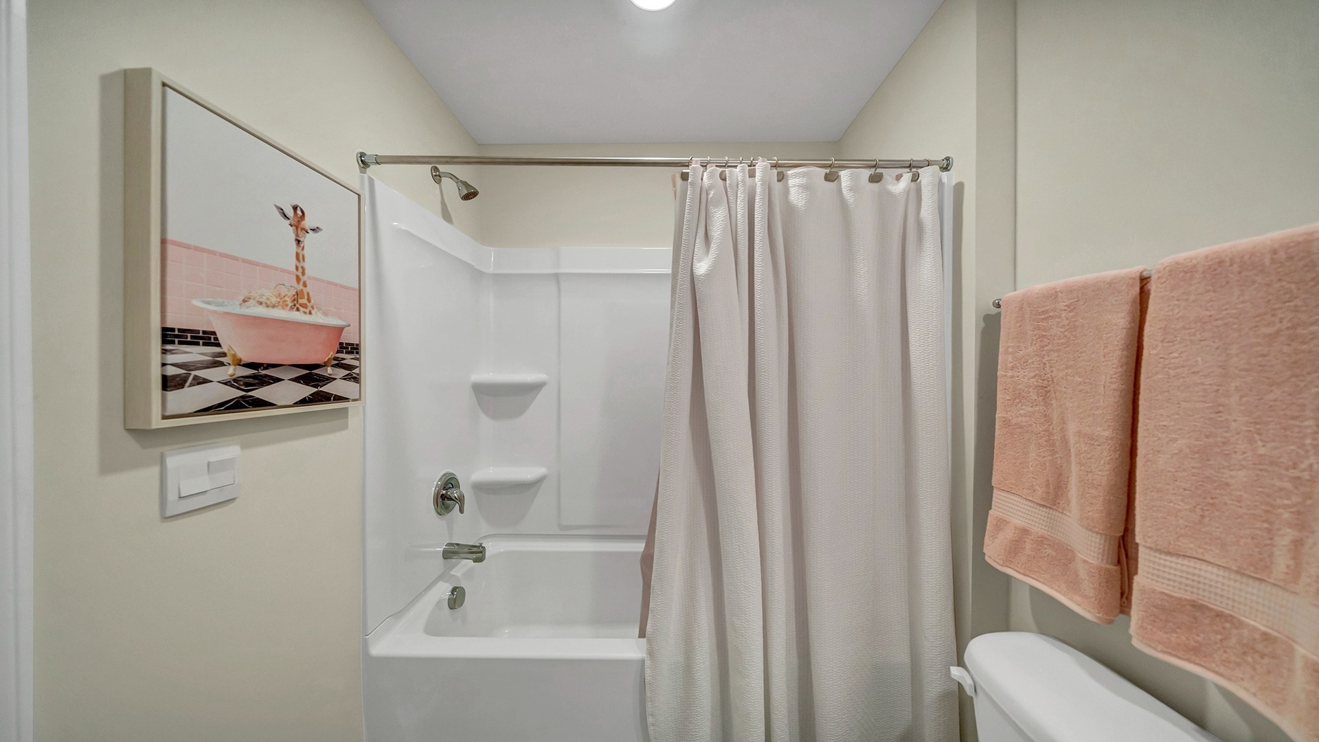 Bathroom 2 upstairs with a shower tub