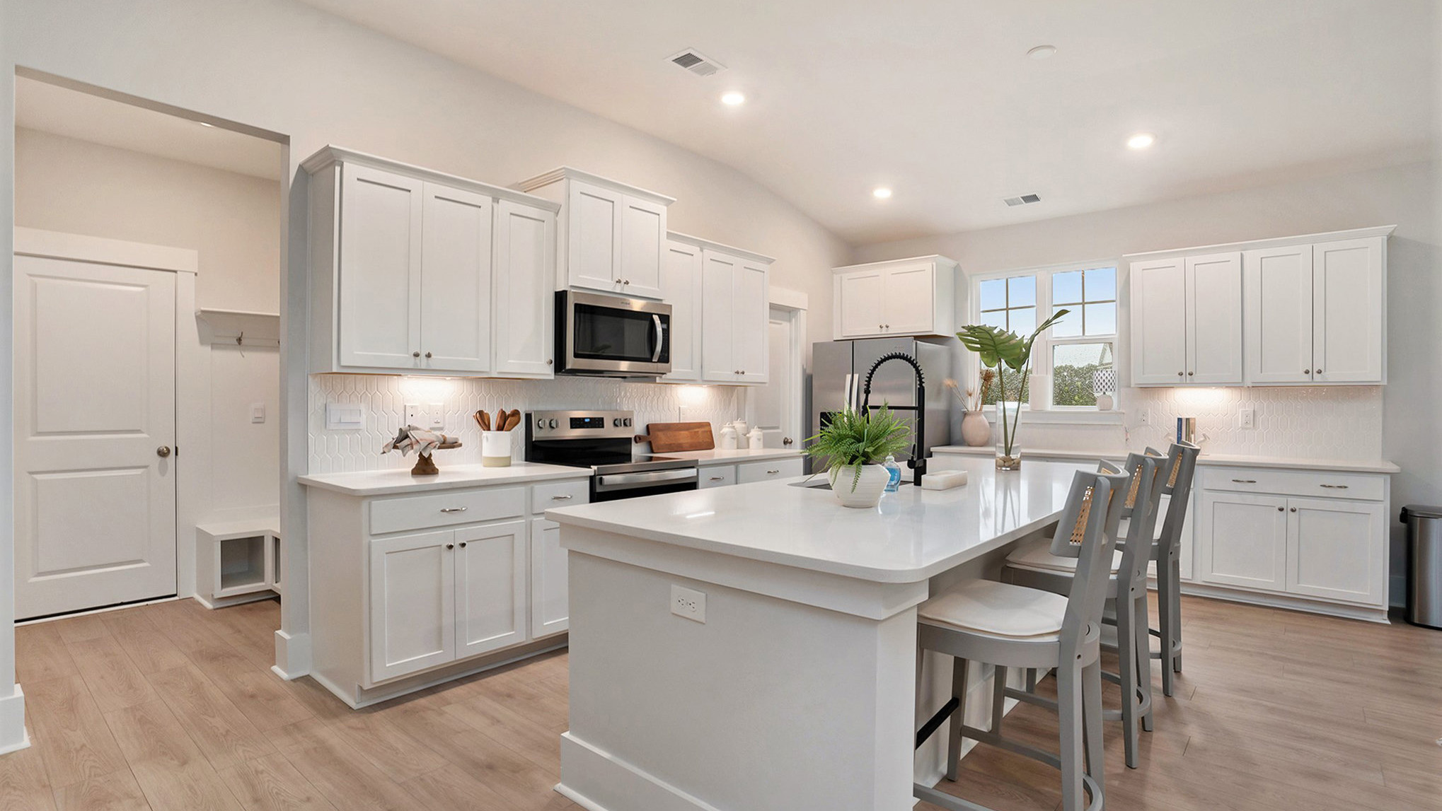 Open kitchen in the Eaton floorplan with a floating kitchen island