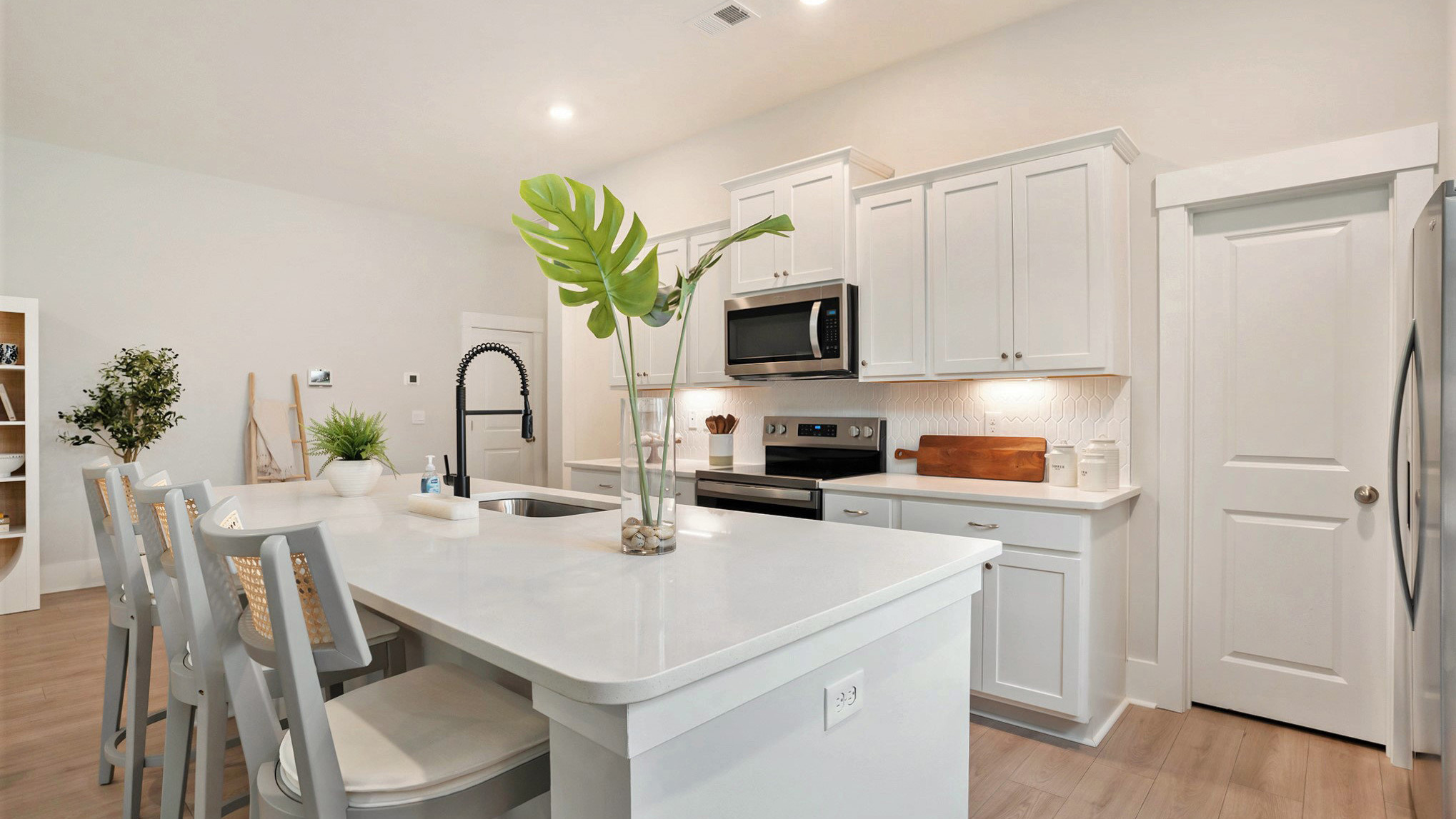 Eaton Kitchen with quartz countertops and white shaker-style cabinets