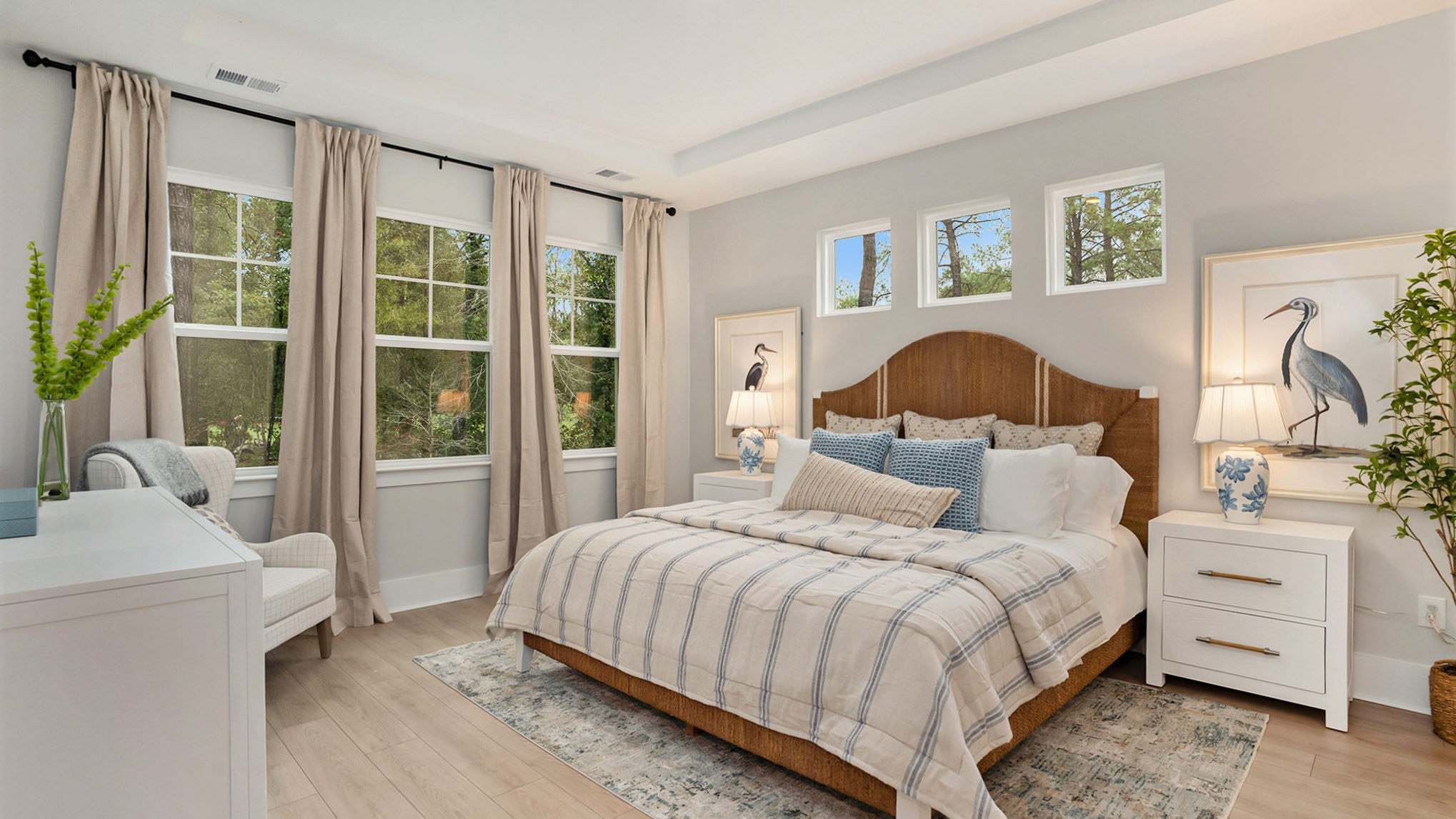 Spacious primary bedroom with lots of windows for natural light in new home for sale in Irmo