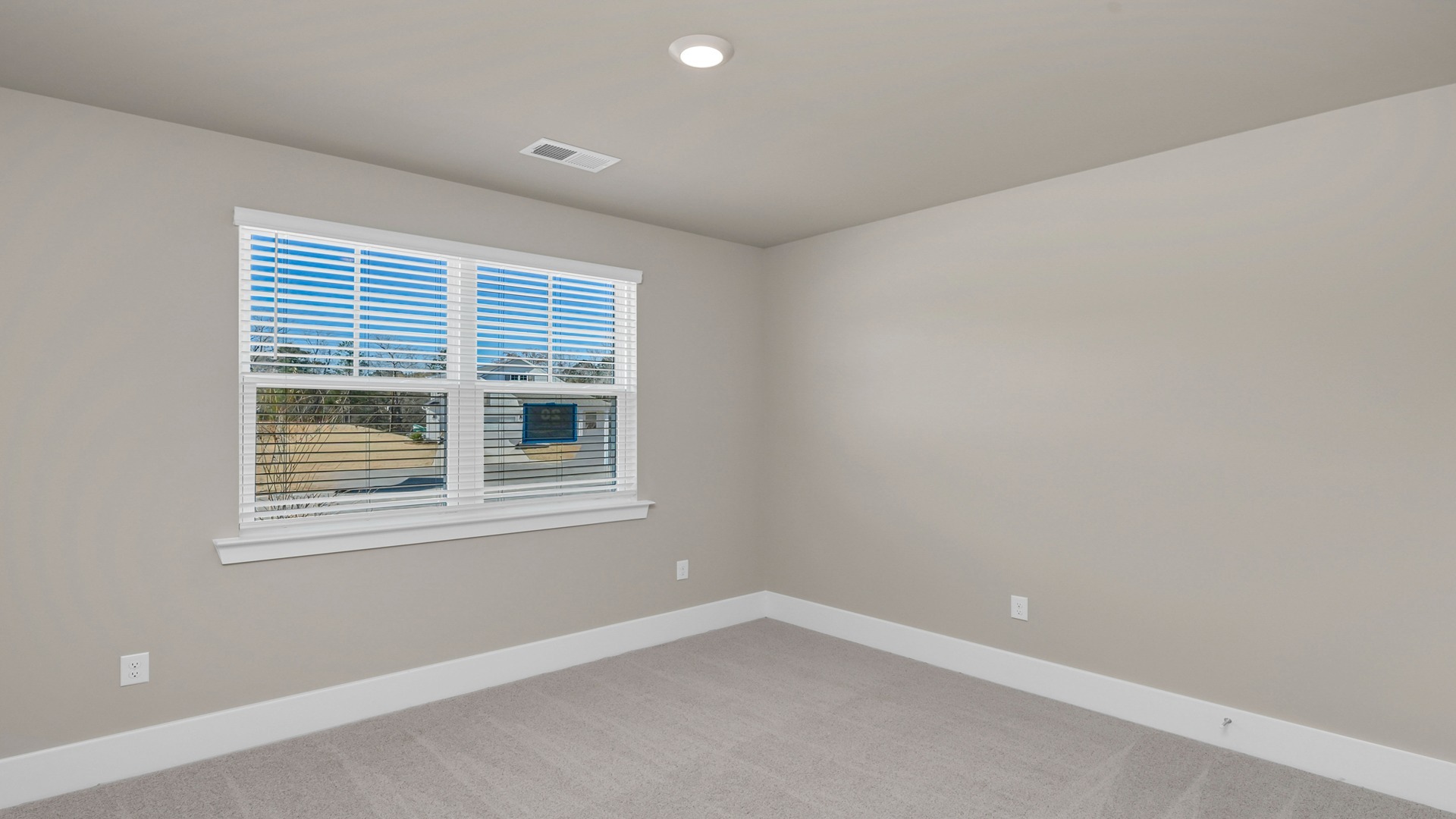 Bedroom 2 with front facing window for light