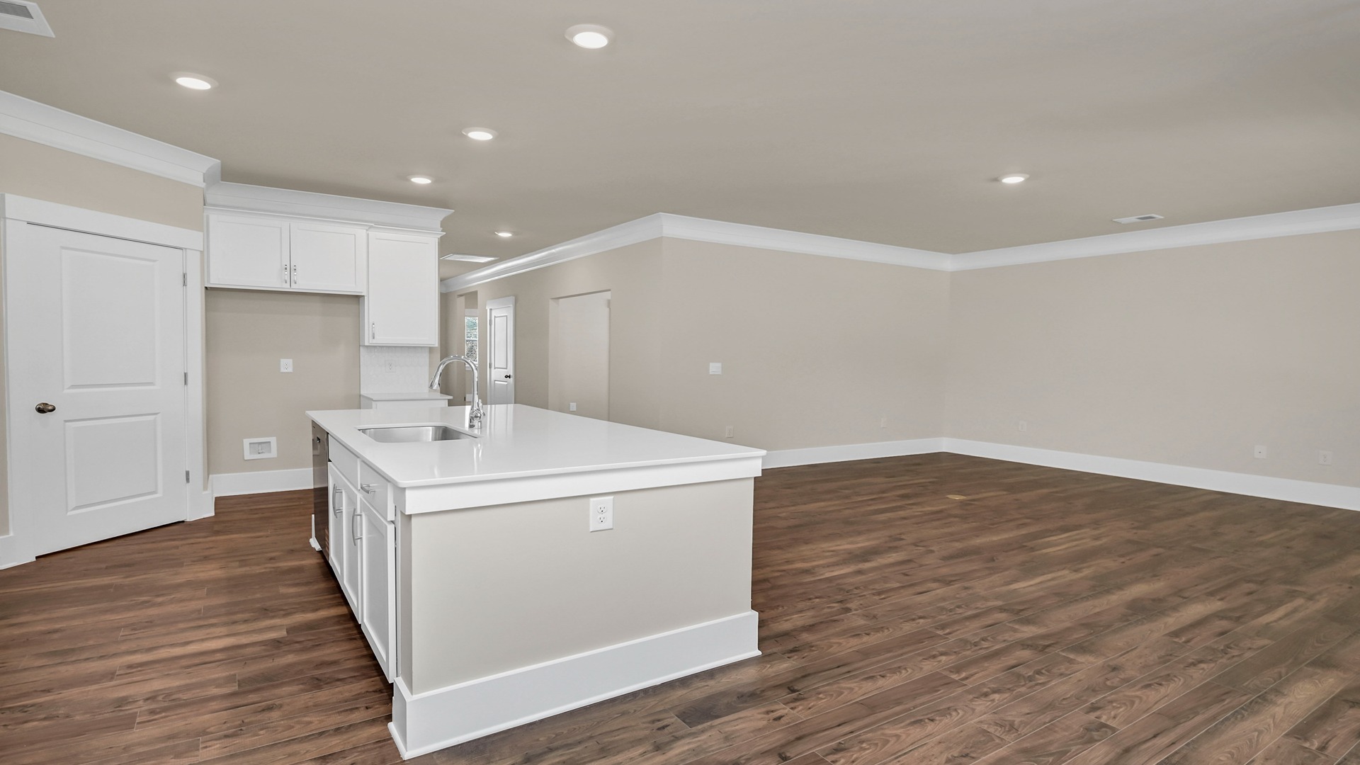 Floating island overlooks the open living area in ranch home for sale in Irmo, SC