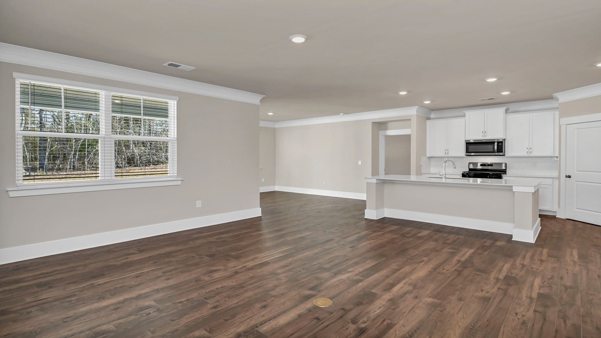 View of kitchen space from the living area of the Bradford floor plan in Dorset Ridge