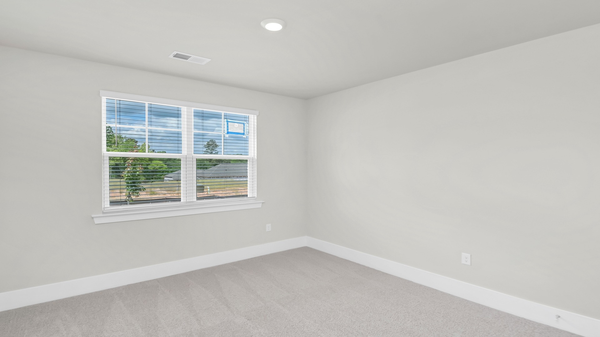 Front bedroom 2 in ranch home for sale off of Kennerly Rd in Irmo, SC