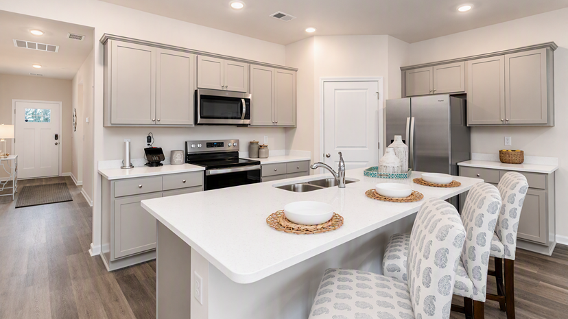 Dover front entrance opens up into the kitchen area