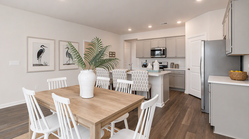 Open concept dining and kitchen areas in new construction home in Sumter, SC