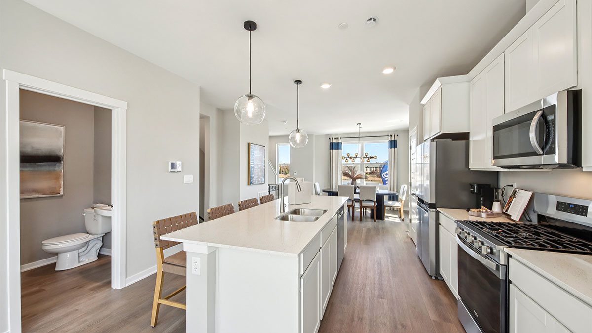 open concept kitchen with stainless steel appliances