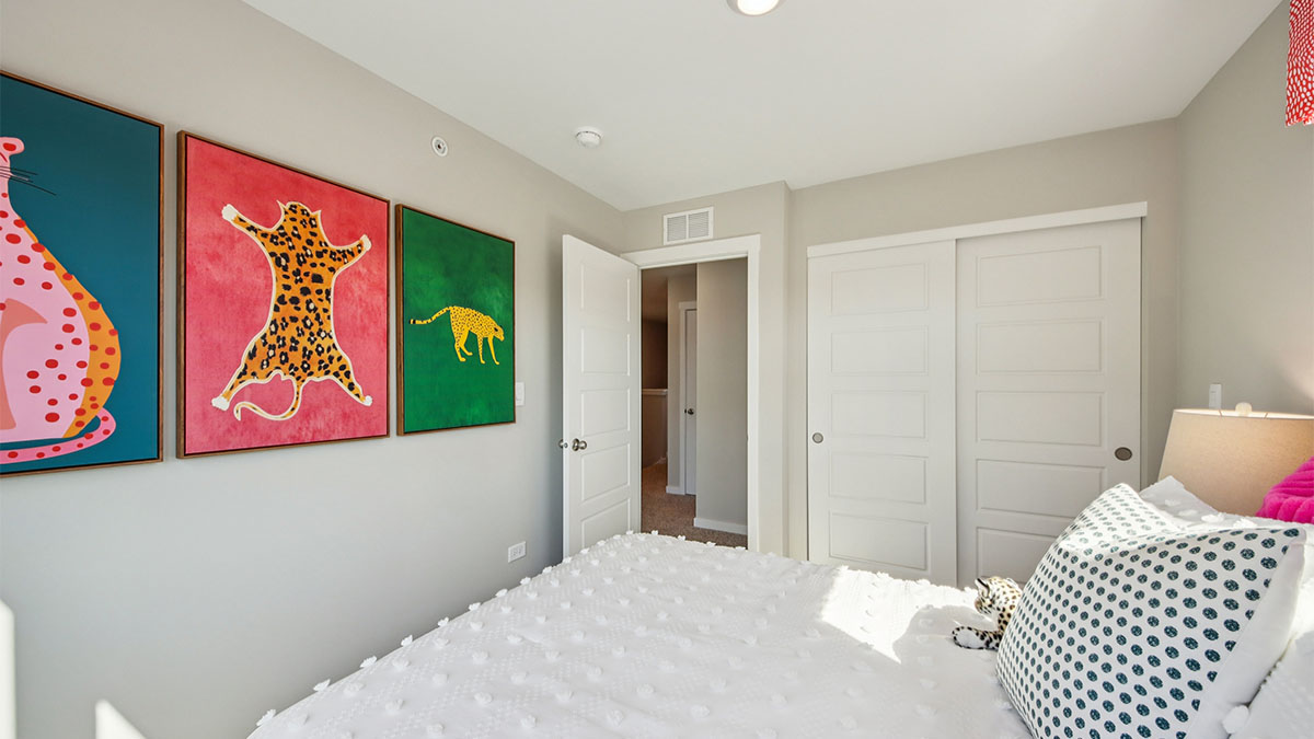 secondary bedroom with full carpet