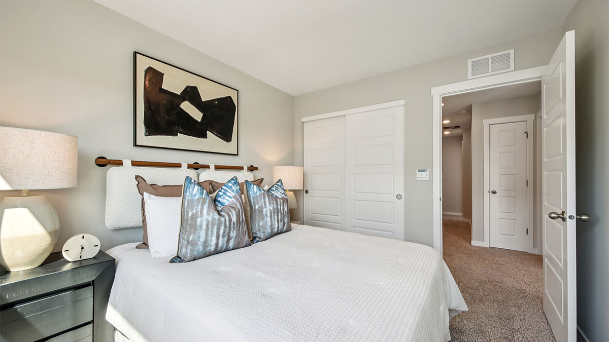 secondary bedroom with full carpet