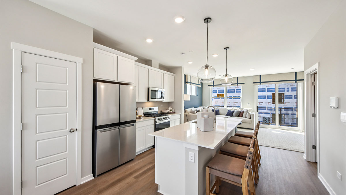open concept living room with view of kitchen