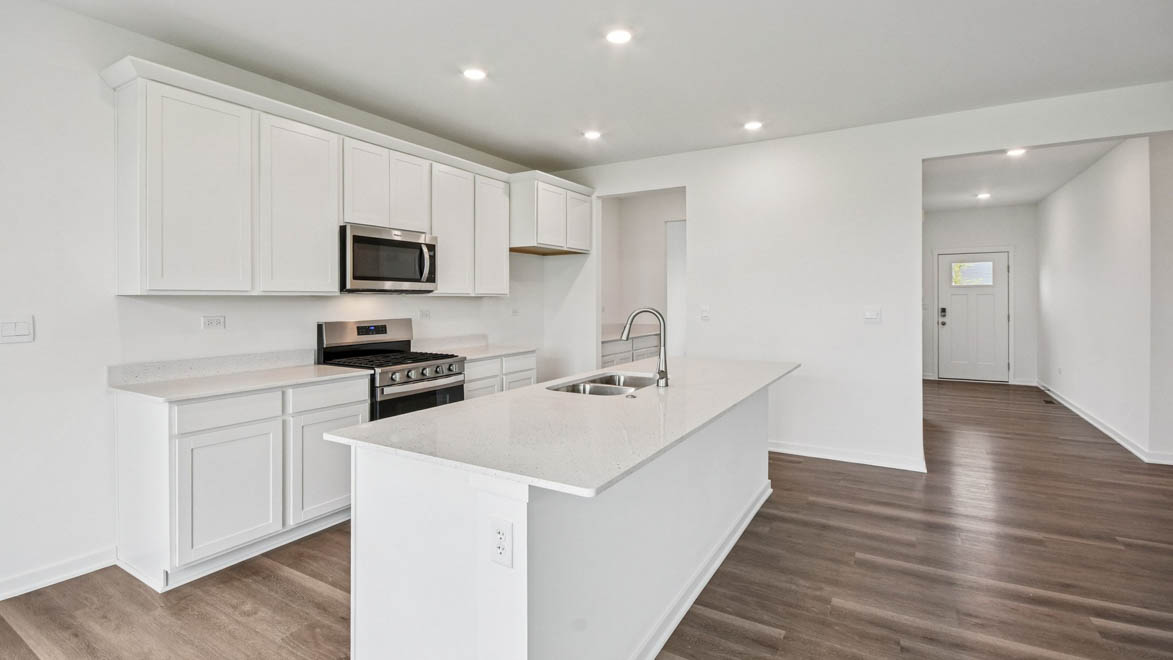 kitchen with white quartz countertops