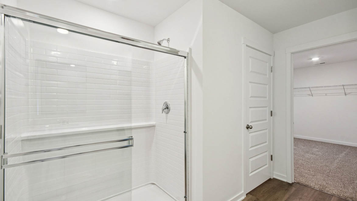 primary bathroom with walk in shower