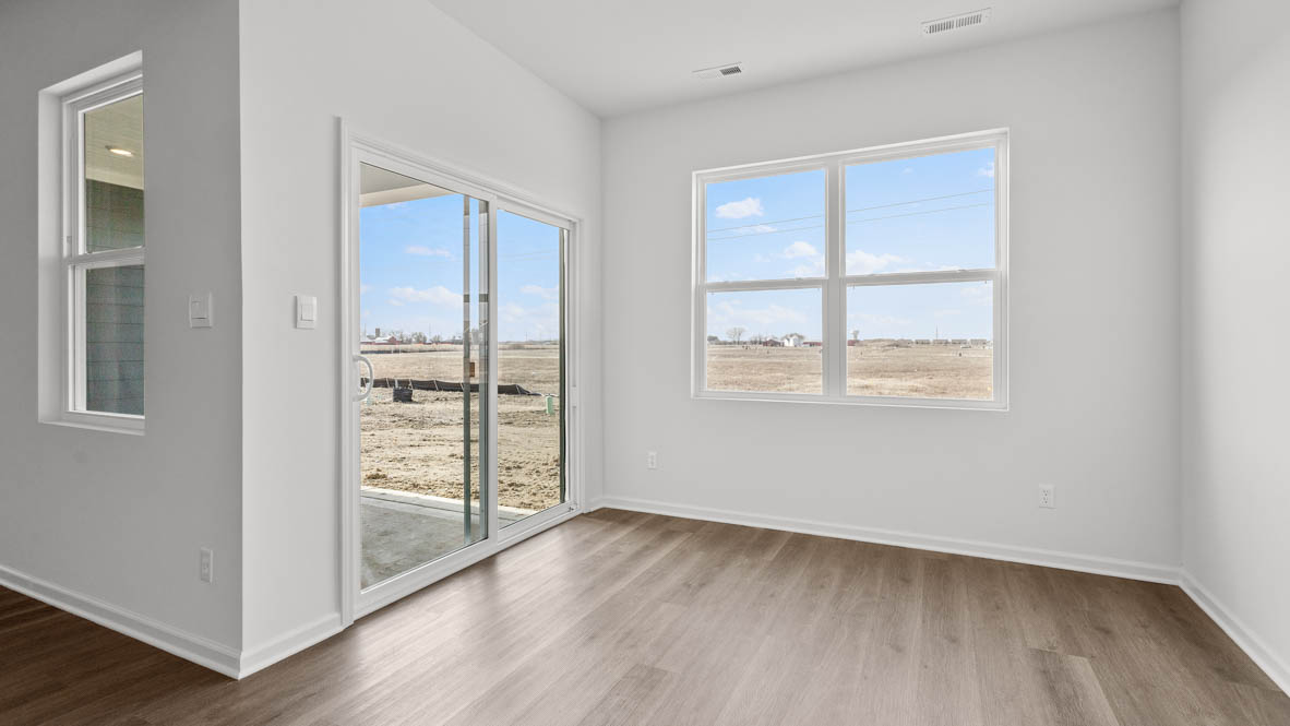 Dining room with sliding door to covered patio