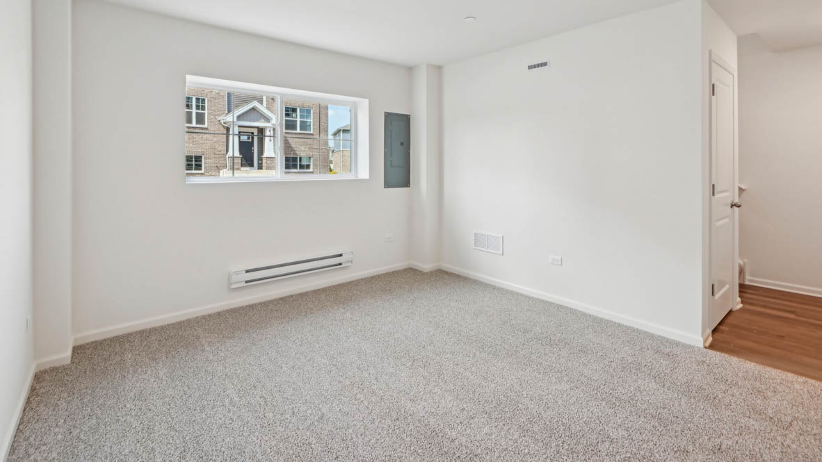 Lower level bonus room with entrance from garage