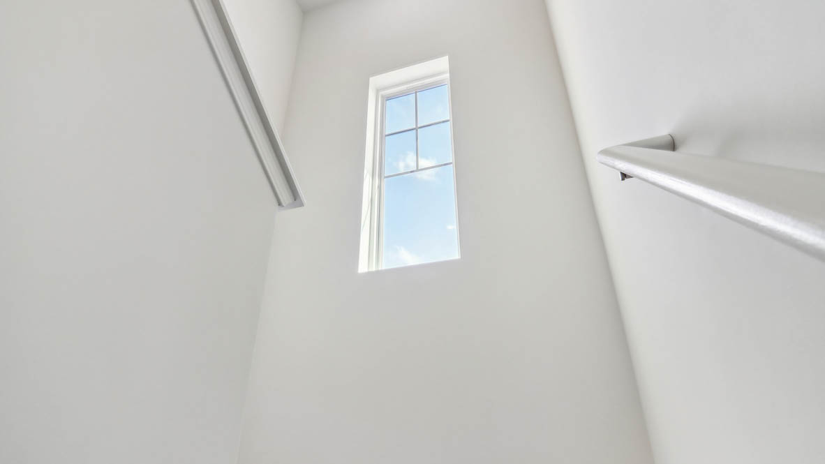 Hallway leading to upper level