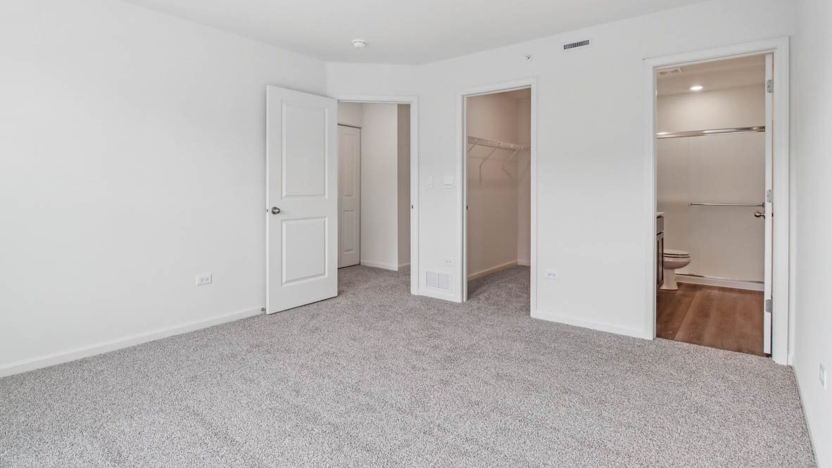 Primary bedroom with connecting en suite