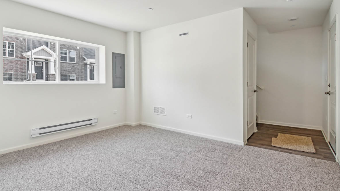 Entry from garage to lower level bonus room