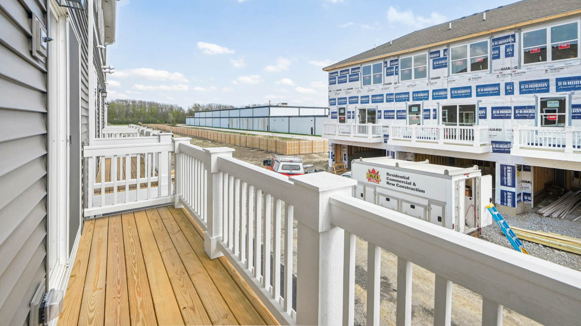 Balcony with white vinyl railings