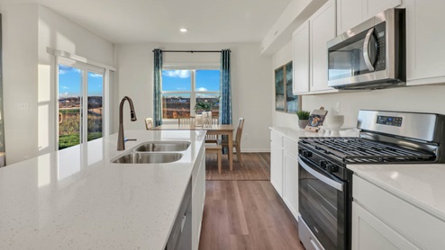 kitchen with white cabinets and stainless steel appliances
