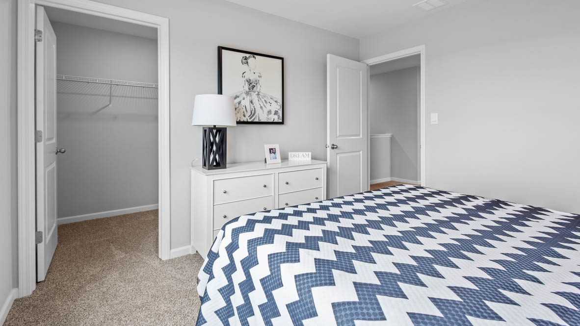 Bedroom number 3 with a walk in closet