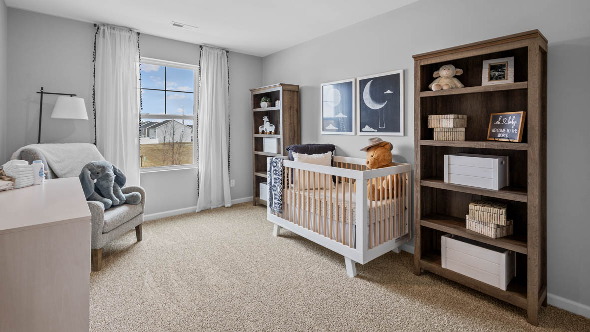 bedroom number two staged as a nursery