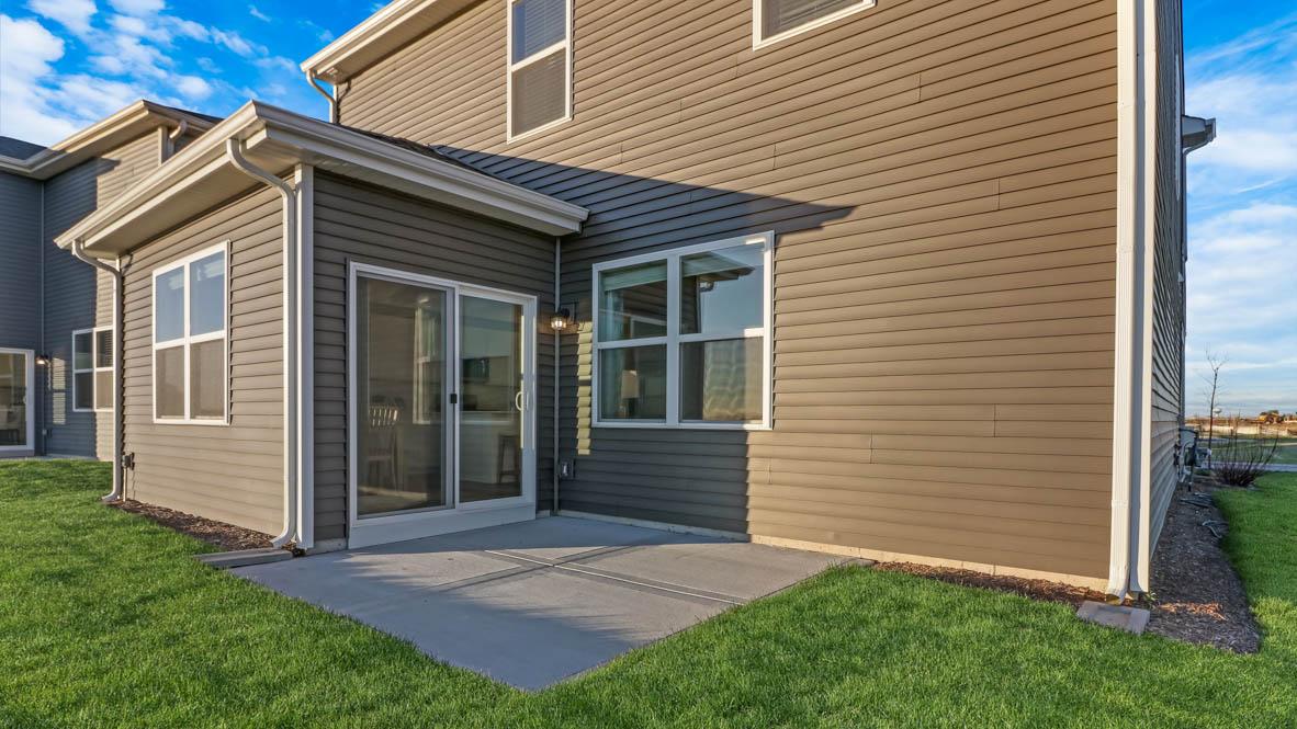 backyard with a patio and full sod