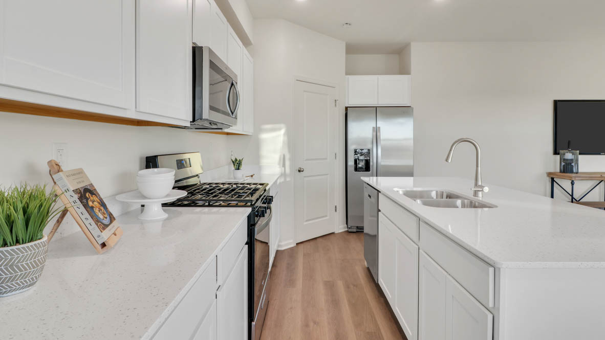 open concept ktichen with stainless steel appliances