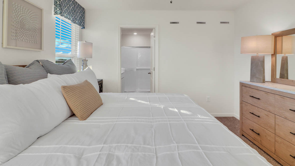 Primary bedroom with connecting en suite