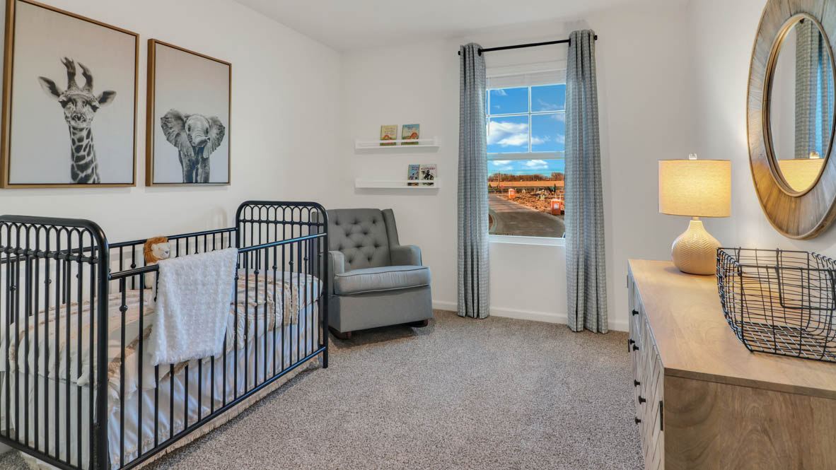 secondary bedroom with carpeted flooring