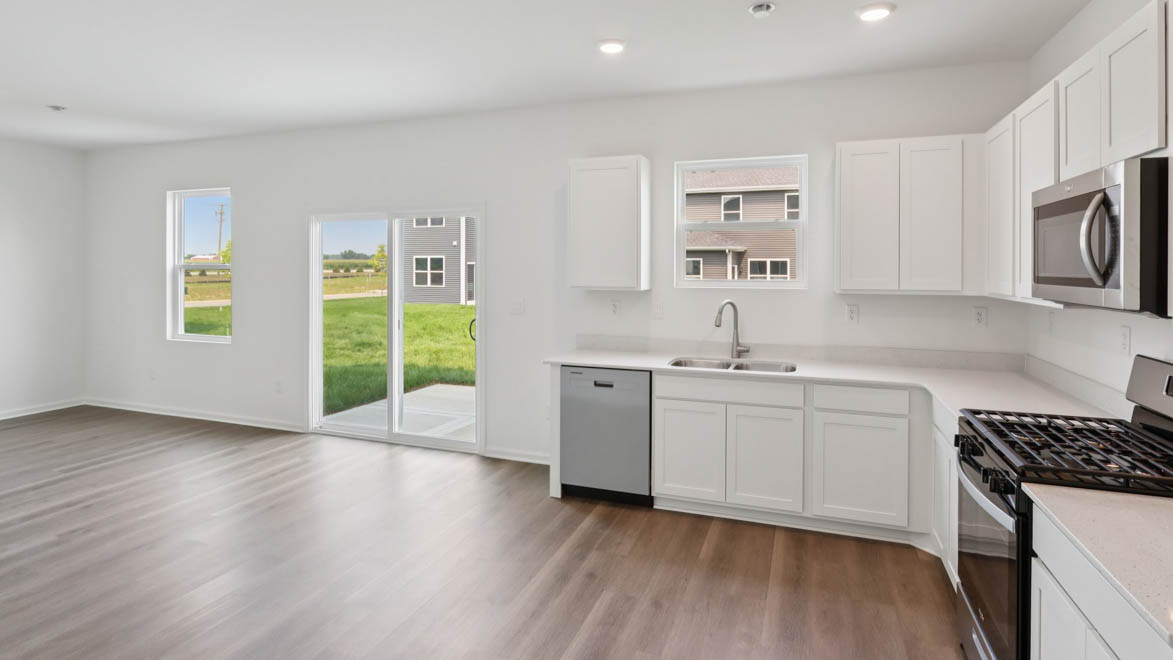 Kitchen and dining room with sliding door to patio