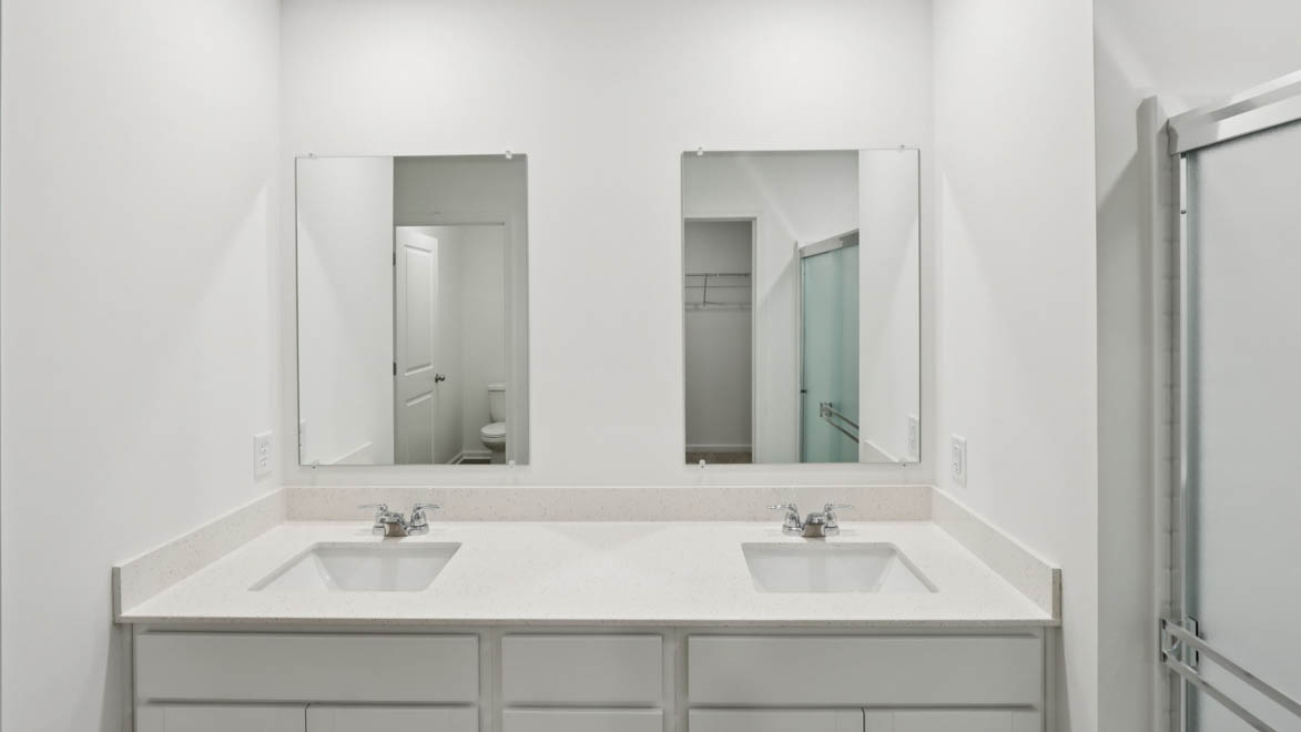 Dual vanity sinks with quartz countertops