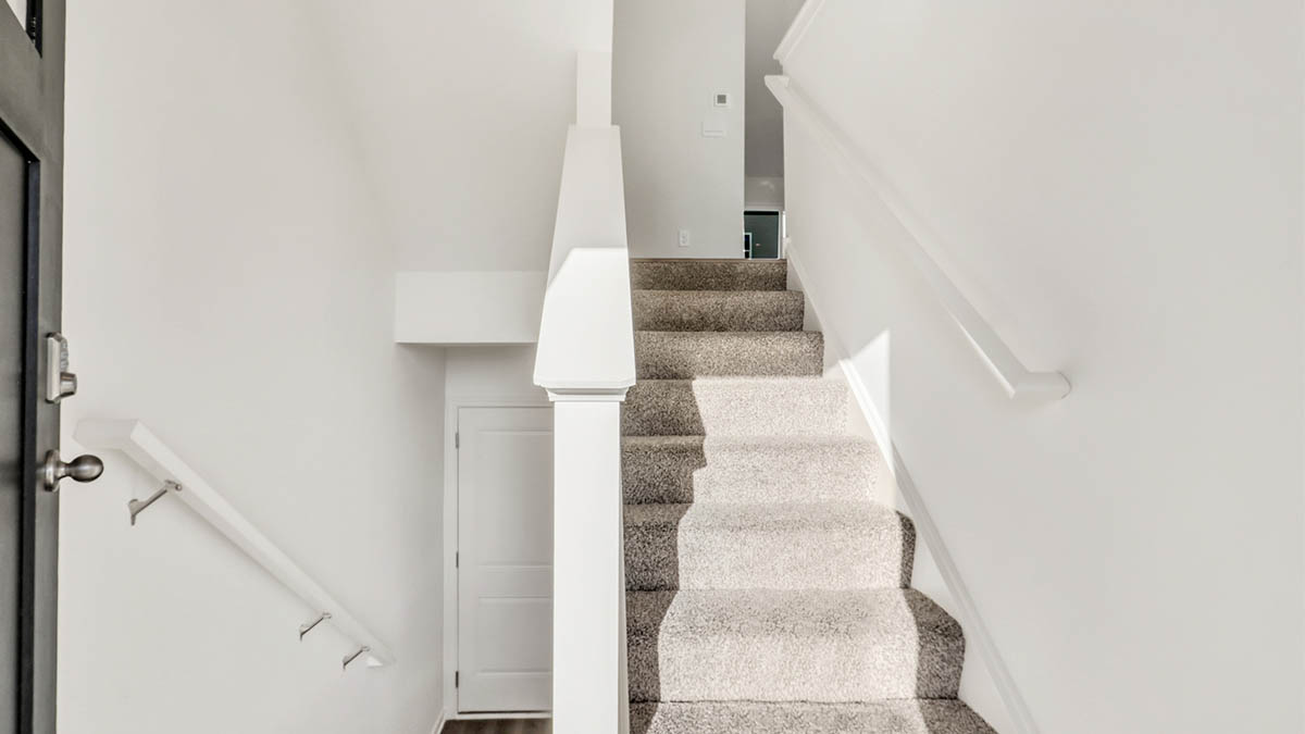Access to main level from front door or garage, of this new D.R. Horton townhome