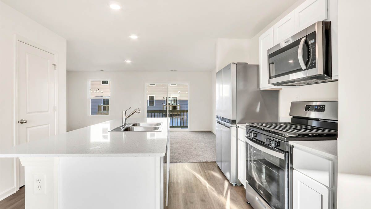 New appliances included, our larger kitchen island with seating anchor the kitchen, next to dining, great rooms, pantry