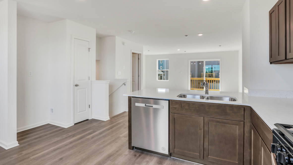 kitchen island overlooking dining room and great room