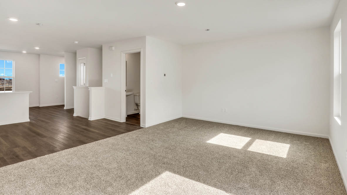 Spacious great room with sliding door to balcony