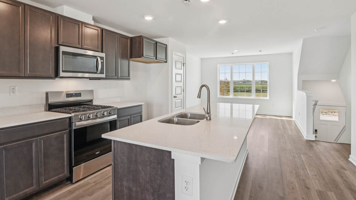 New appliances included, with our kitchen island, a sink, seating that anchor our kitchen, pantry, near dining, living rooms