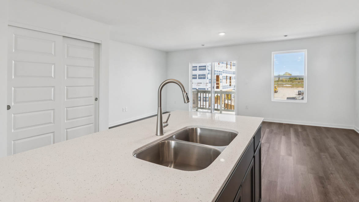 Central kitchen island with sink, seating, crafted to anchor the home, pantry, prep zones, perfect for entertaining and everyday gathering