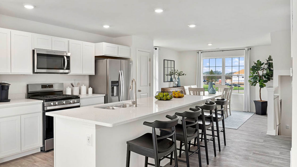 Island overhang with 4 barstools for seating