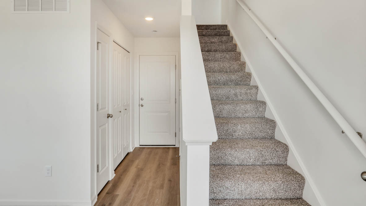 Entrance door to stairs and flex room