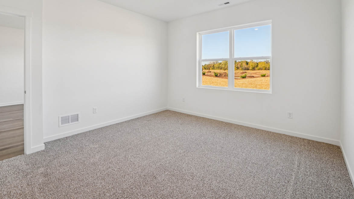 Spacious primary bedroom