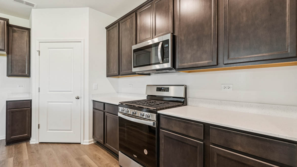 open concept kitchen with stainless steel appliances