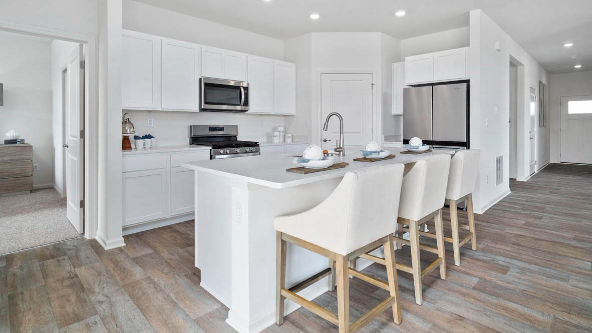 Kitchen with walk in pantry and stainless steel appliances