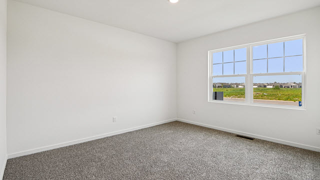 Interior bedroom with large window