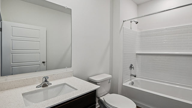 Interior bathroom with sink and full-sized shower