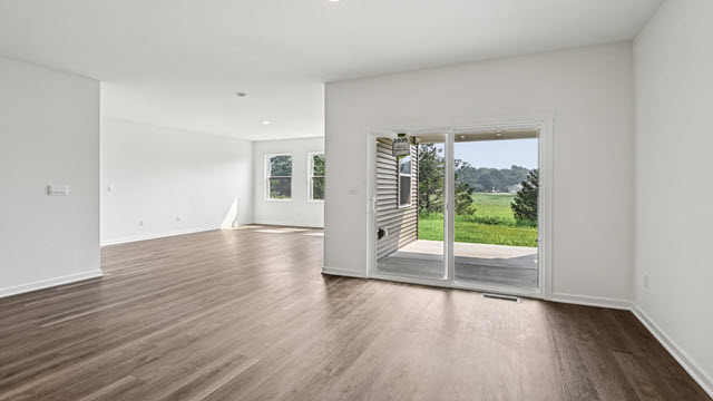 Interior dining area next to back patio doors