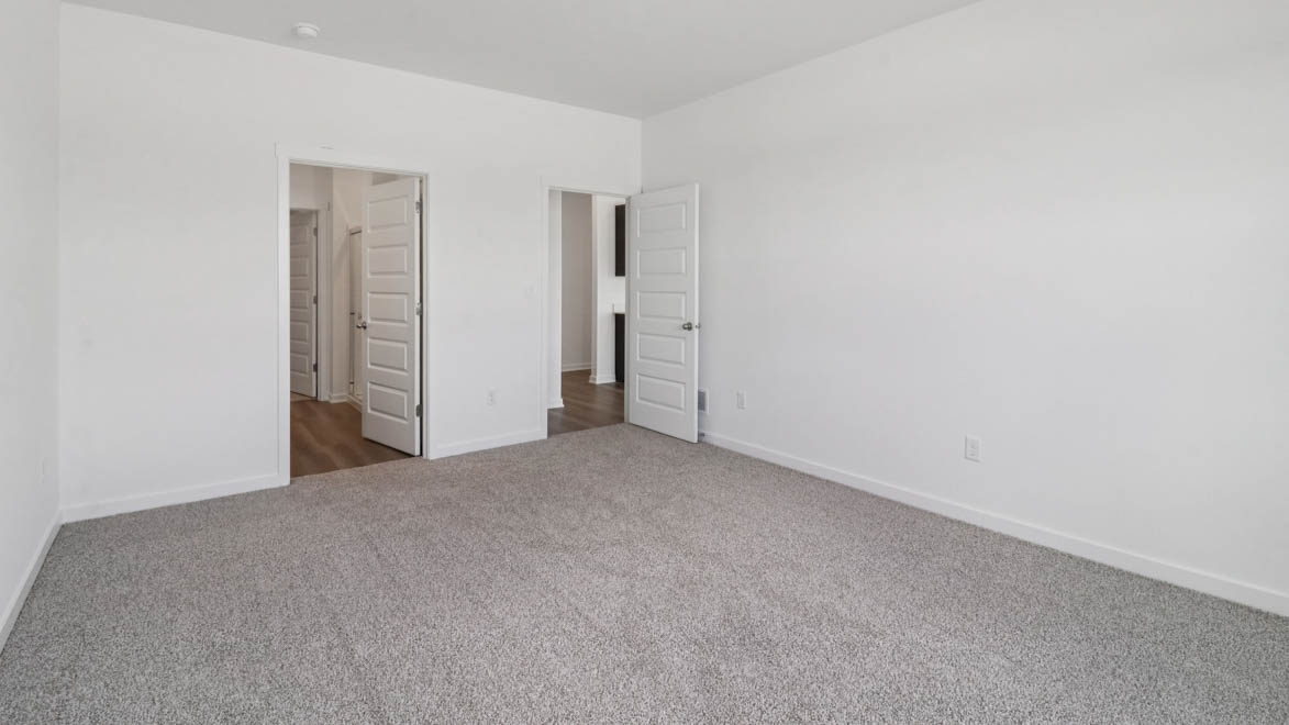 Primary bedroom with connected en suite