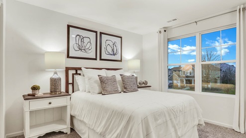 first bedroom with large window view