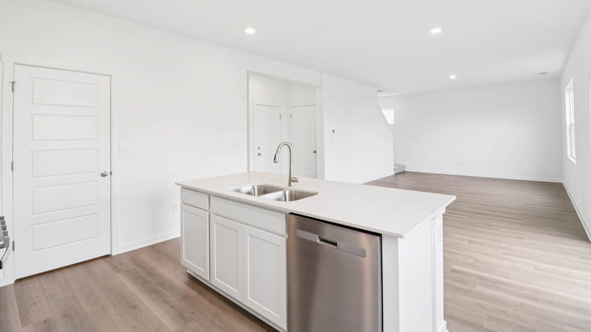 Kitchen island overlooking great room and dining room