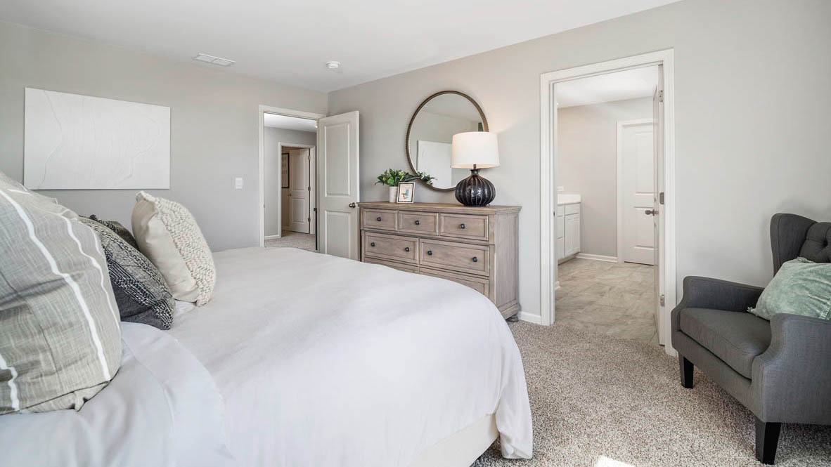 Primary bedroom with connecting en suite