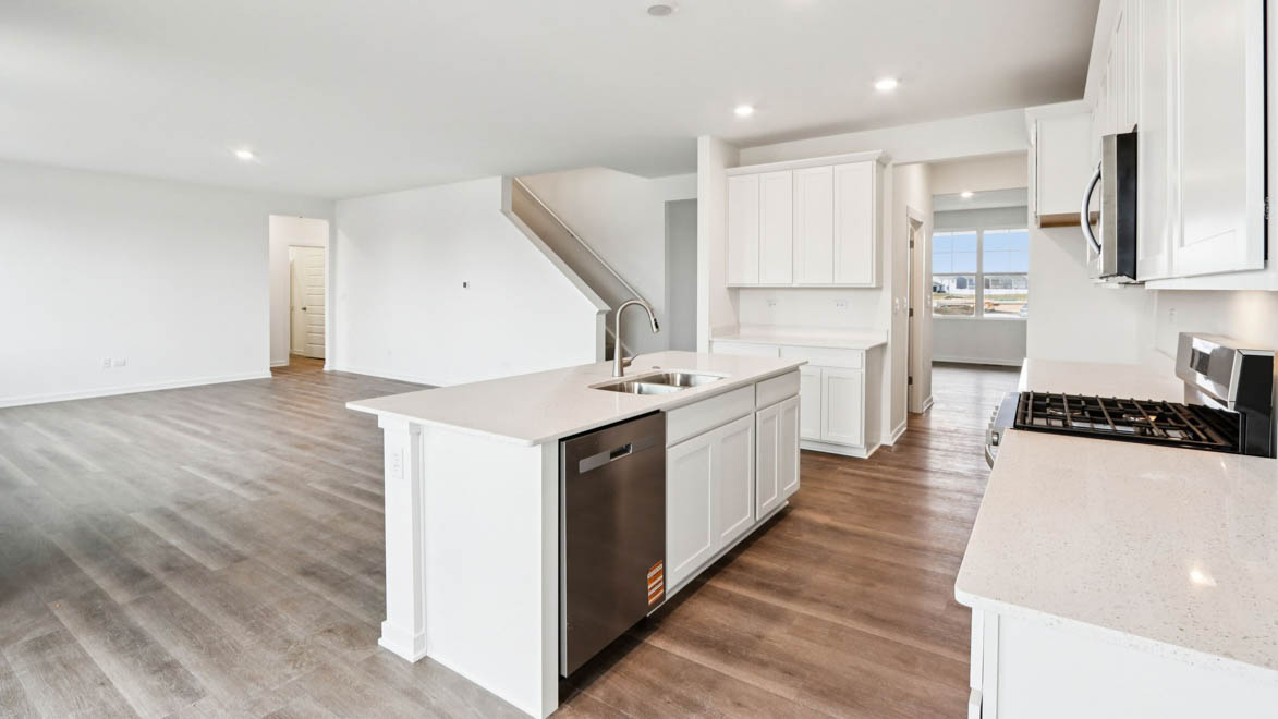 kitchen island with sink and dishwasher